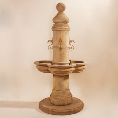 Beaumont Fountain against brown background.