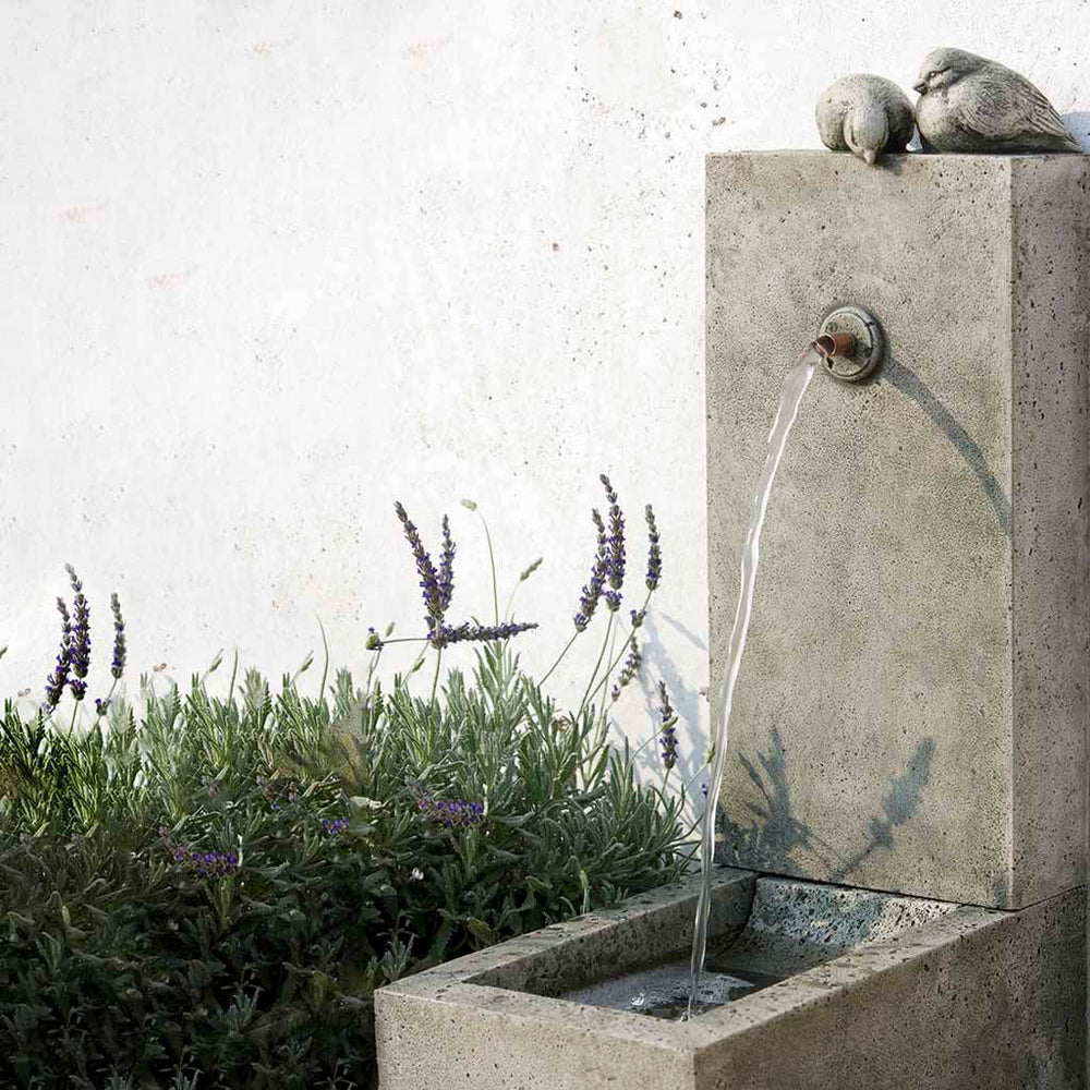 Bird Element Fountain on gravel in the backyard upclose.