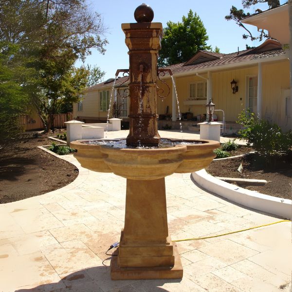 Bourdoux Fountain on concrete near the house.