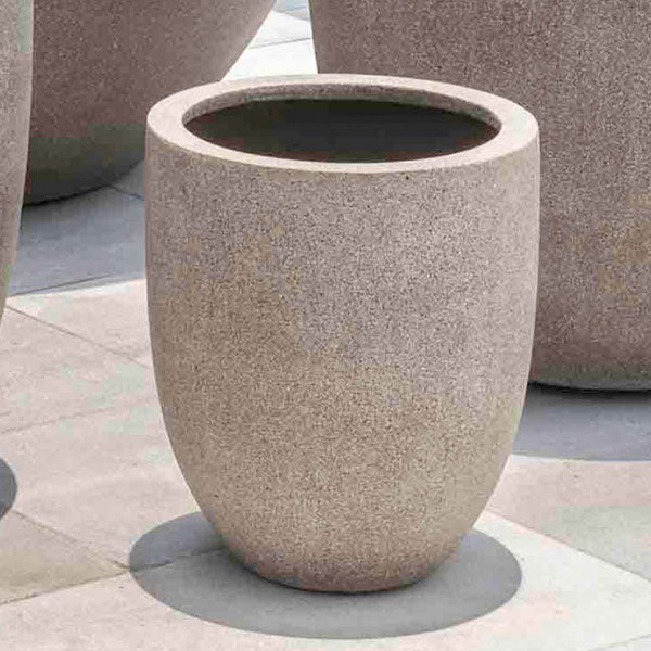 Bradford Planter, Extra Small - Riverstone Premium Lite - S/1 on concrete in the backyard