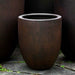 Bradford Planter, Extra Small - Rust Lite - S/1 on concrete in the backyard