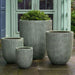 Bradford Planter, Extra Small - Verdigris Lite S/1 on concrete filled with plants