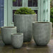 Bradford Planter in verdigris lite on concrete in backyard
