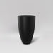 Brannan Tapered Round Fiberglass Planter in matte black against gray background.
