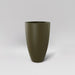 Brannan Tapered Round Fiberglass Planter in matte bronze against gray background.