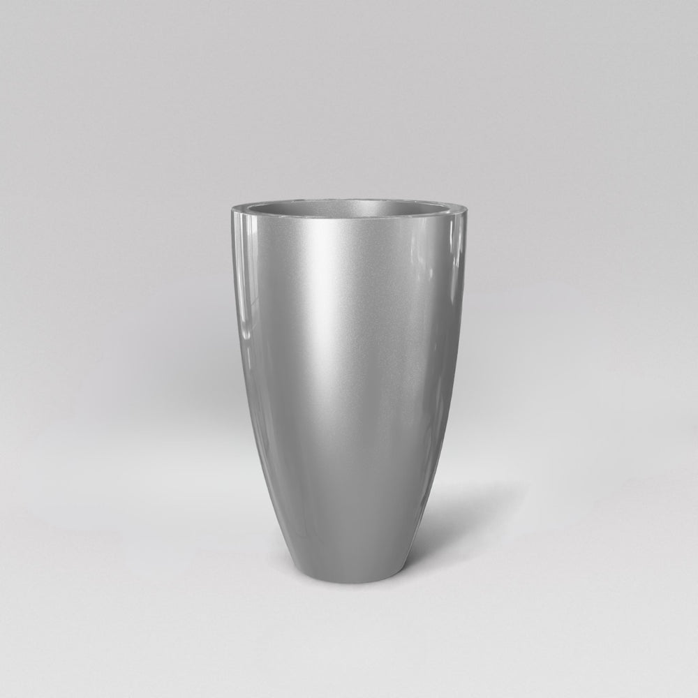 Brannan Tapered Round Fiberglass Planter in metallic silver against gray background.