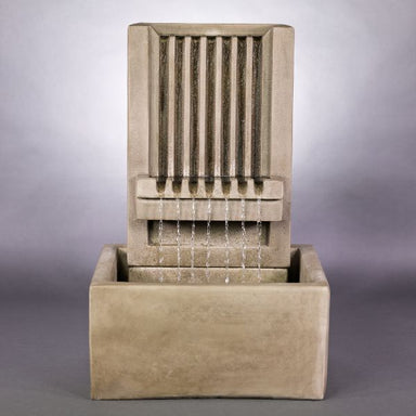 Brentwood Channel Patio Fountain, Short against gray background.