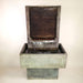 Brentwood Fountain Short with base against brown background.