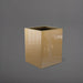Brisane Tall Corner Fiberglass Planter in gloss metallic gold against gray background.