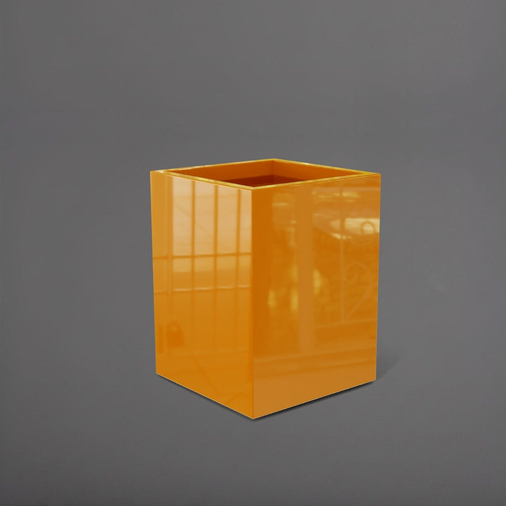 Brisane Tall Corner Fiberglass Planter in gloss tangerine against gray background.