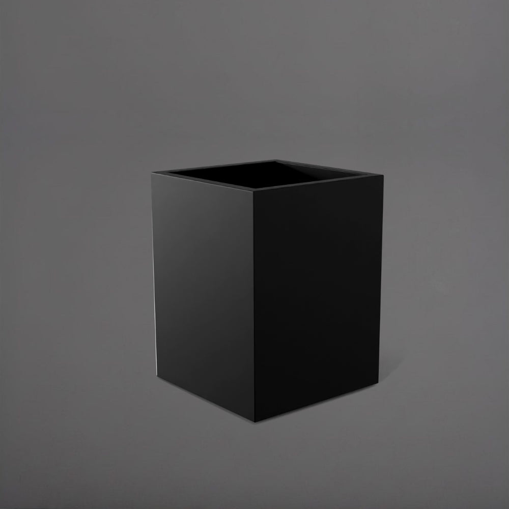 Brisane Tall Corner Fiberglass Planter in matte black against gray background.