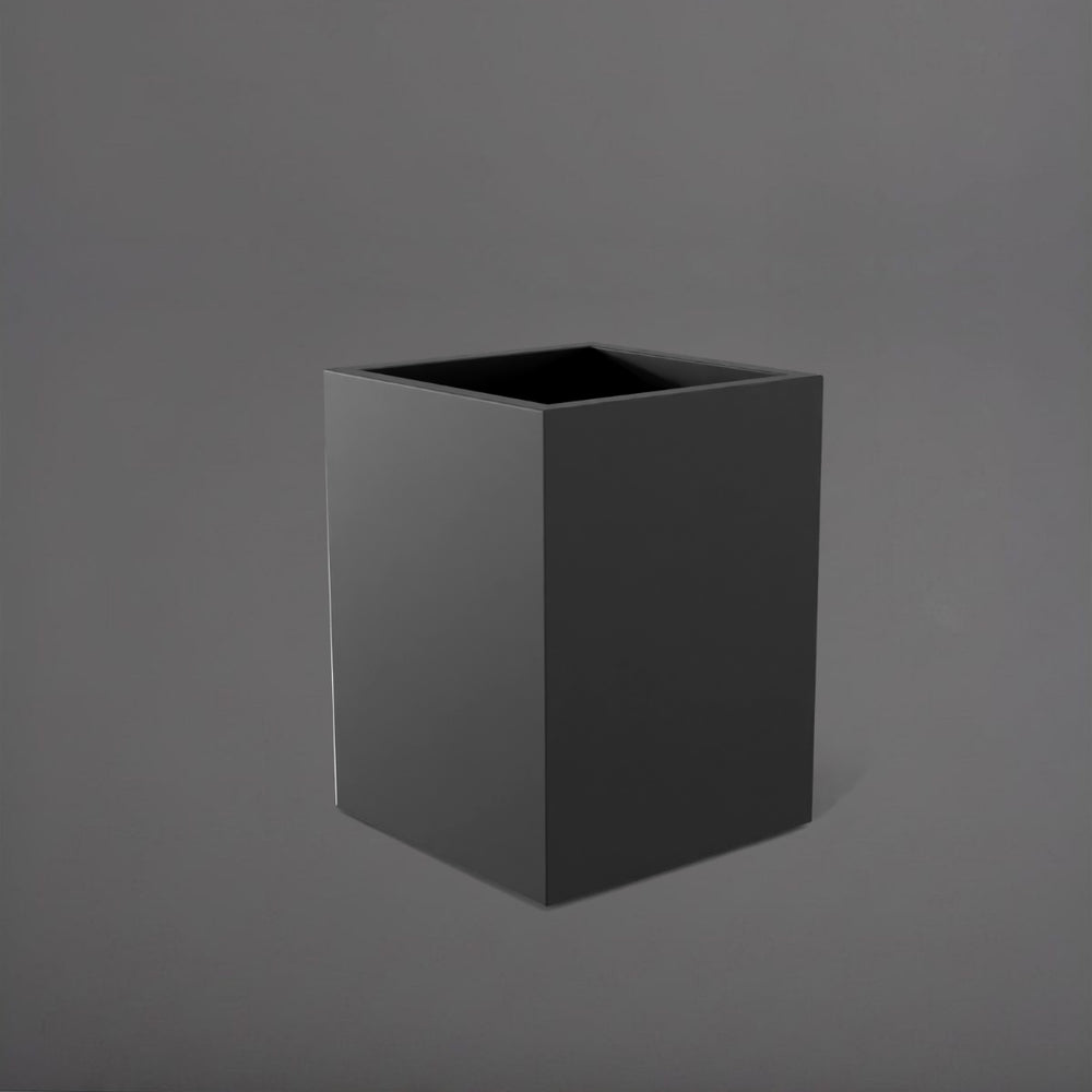 Brisane Tall Corner Fiberglass Planter in matte charcoal against gray background.