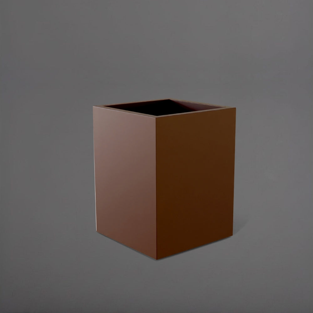 Brisane Tall Corner Fiberglass Planter in matte dark brown against gray background.