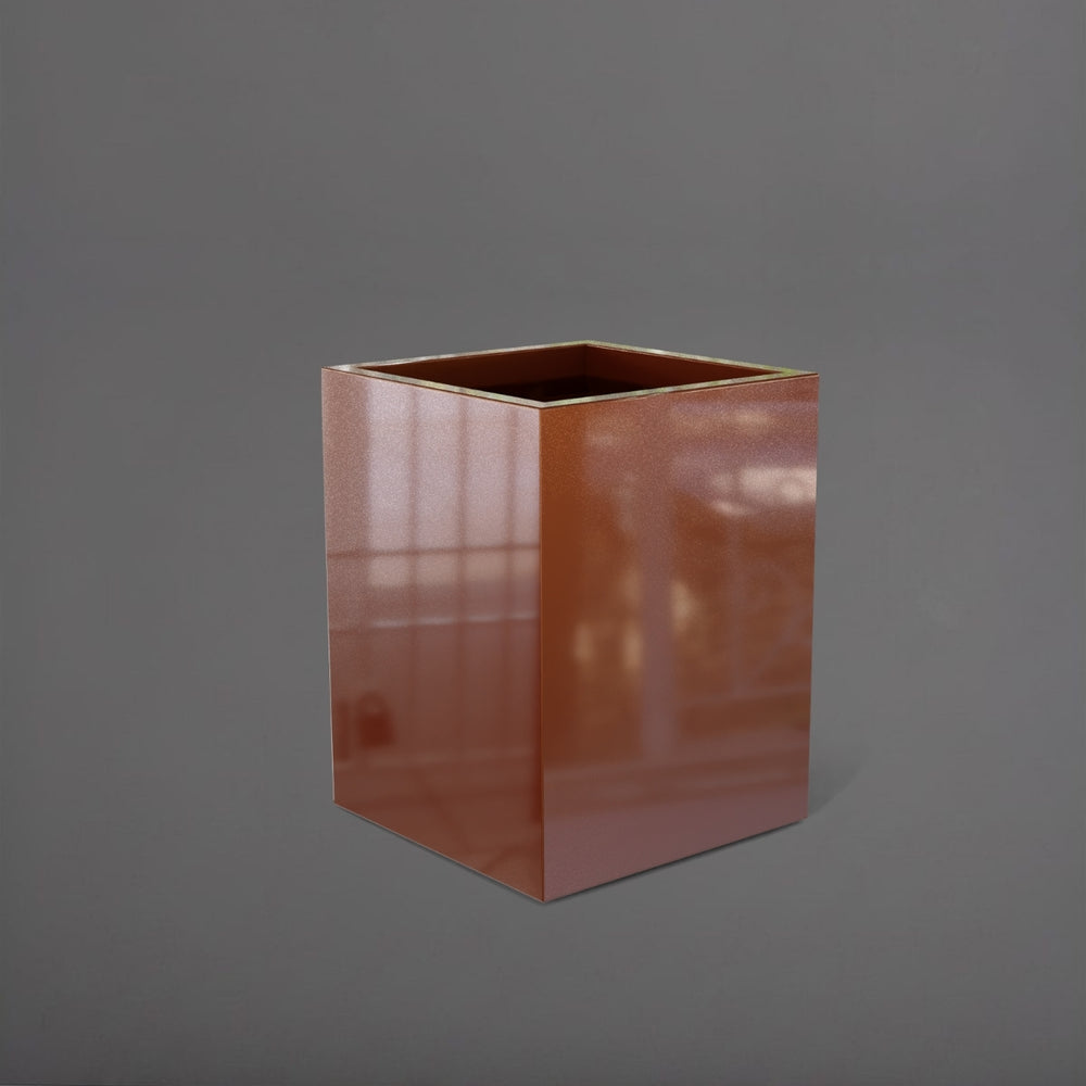 Brisane Tall Corner Fiberglass Planter in metallic bronze against gray background.