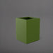 Brisane Tall Corner Fiberglass Planter in satin green against gray background.