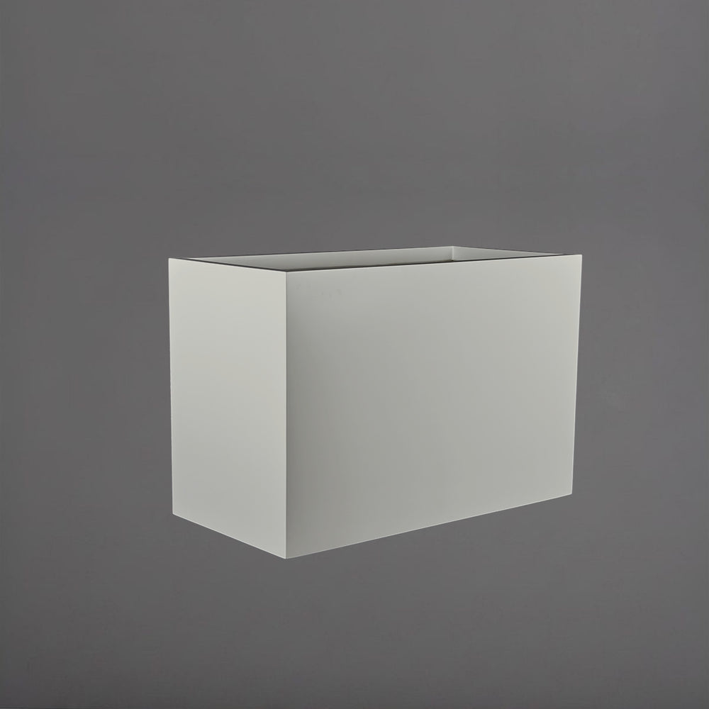 Brisbane Wide Rectangle Fiberglass Planter in matte cement grey against gray background.