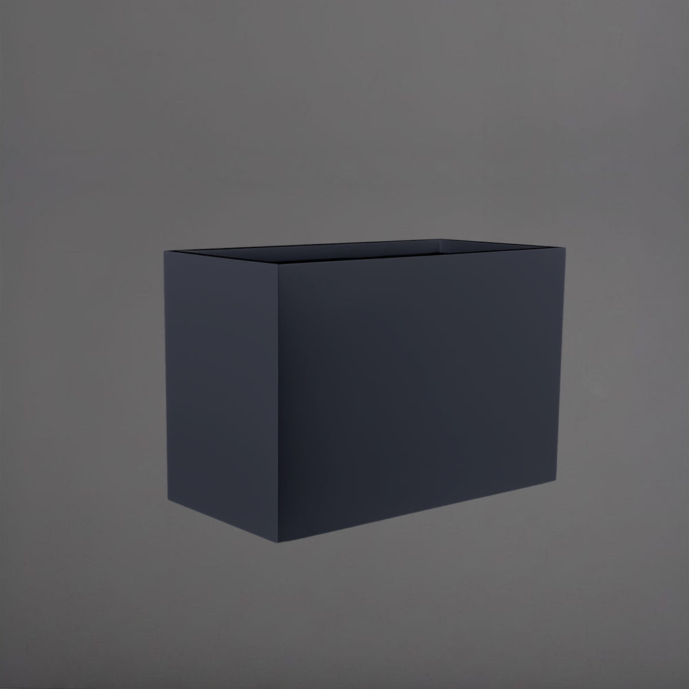 Brisbane Wide Rectangle Fiberglass Planter in matte charcoal against gray background.