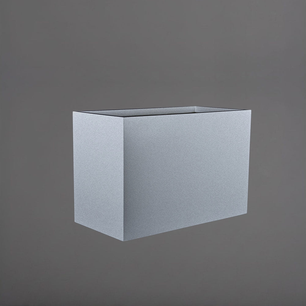 Brisbane Wide Rectangle Fiberglass Planter in metallic silver against gray background.