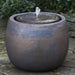 Bronze Boden Fountain Bubbler in action on stone patio