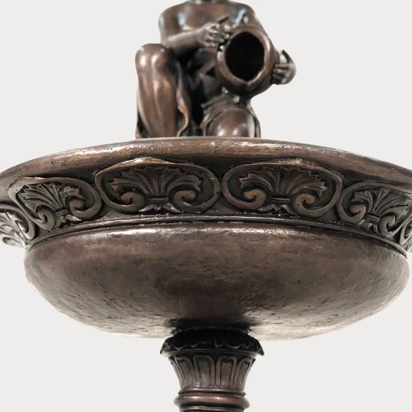 Bronze Boy with jar tray fountain upclose