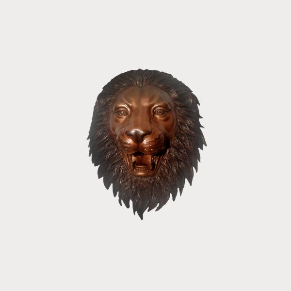 Bronze Lion face wall fountain sculpture against gray background