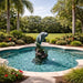 Bronze Manatee Fountain Sculpture in action at the center of the swimming pool.