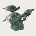 Bronze Sea turtle Trio Fountain Sculpture against gray background