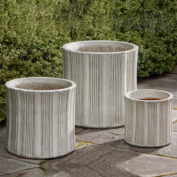 Brush Pot Planter - Cream - S/3 on concrete in the backyard