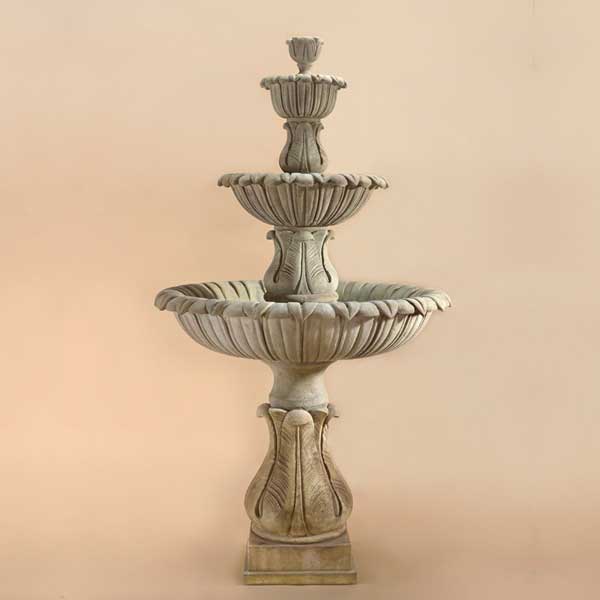 Calanthia Three Tier Fountain against brown background.