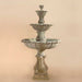 Calanthia Three Tier Fountain against brown background.