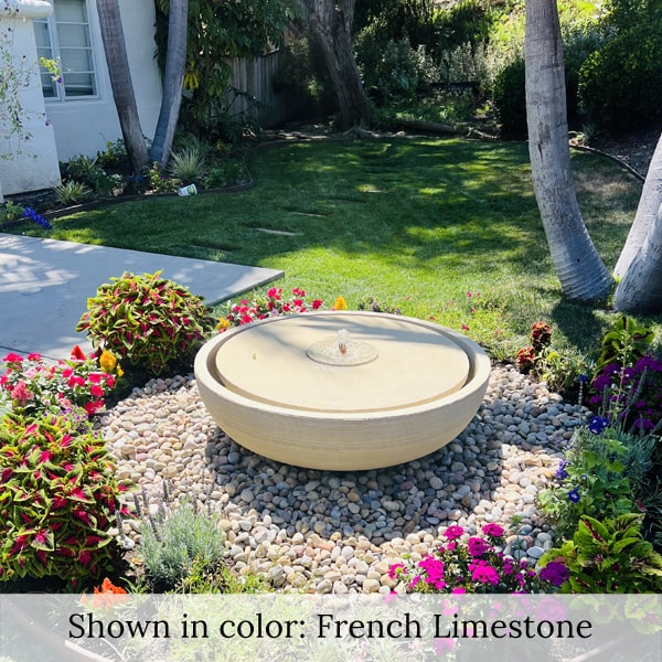 Campania Large Girona Fountain in french Limestone in rock garden.
