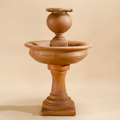 Cannes Fountain against brown background.
