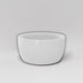 Casablanca Bowl Fiberglass Planter in gloss bright white against gray background.