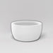 Casablanca Bowl Fiberglass Planter in matte bright white against gray background.