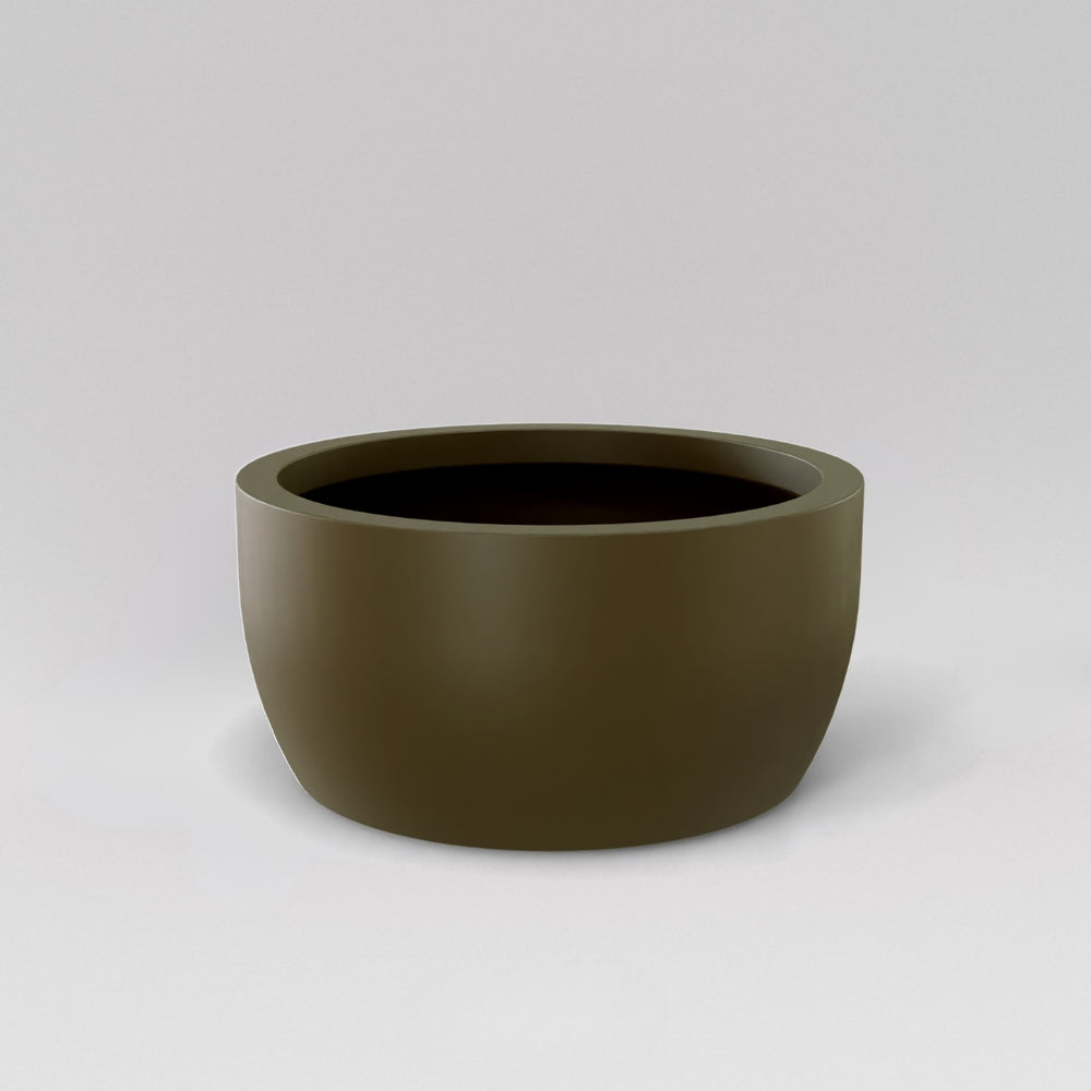 Casablanca Bowl Fiberglass Planter in matte bronze against gray background.