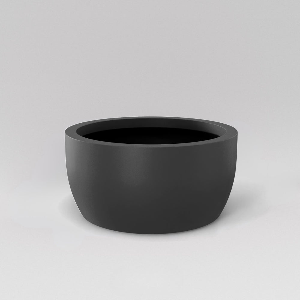 Casablanca Bowl Fiberglass Planter in matte gunmetal against gray background.