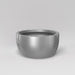 Casablanca Bowl Fiberglass Planter in metallic silver against gray background.
