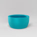 Casablanca Bowl Fiberglass Planter in satin seafoam green against gray background.