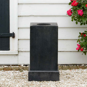 Classic Pedestal, Tall on gravel near red flowers