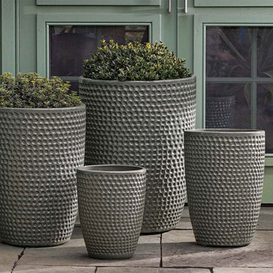 Coin Pot Planter, Tall - Pewter Green - S/4 on concrete filled with plants