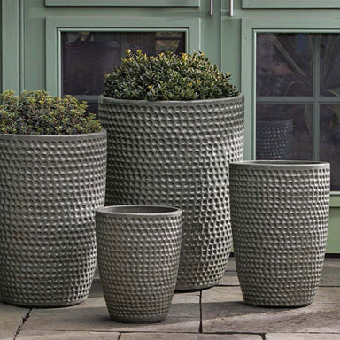 Coin Pot, Tall - Pewter Green - S/4 on concrete filled with plants