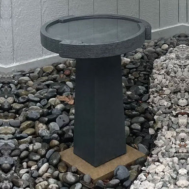 Concept Birdbath Small on rocks in the backyard