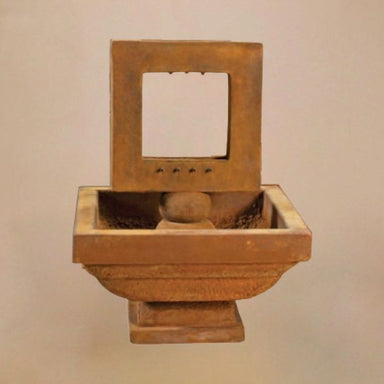 Contempo Square Fountain against brown background.