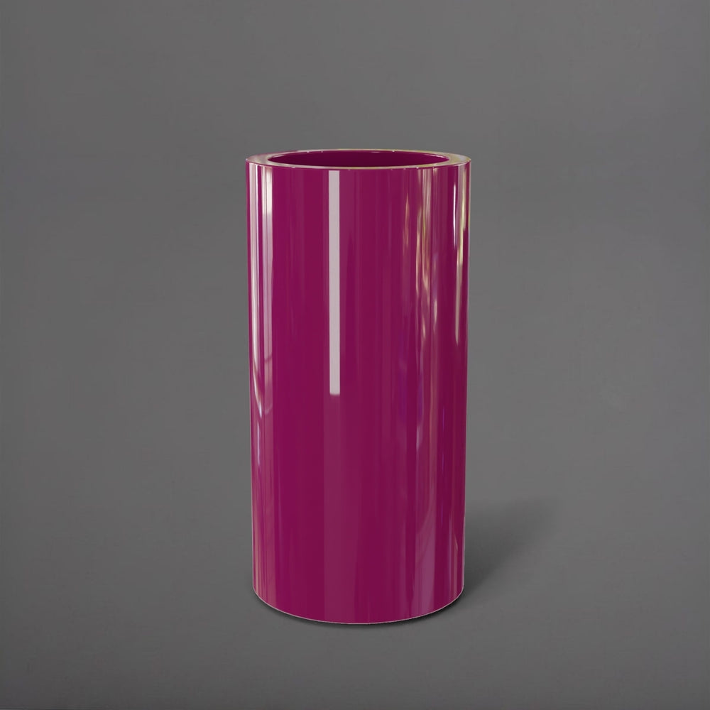 Corry Tall Cylinder Fiberglass Planter in gloss eggplant against gray background. 