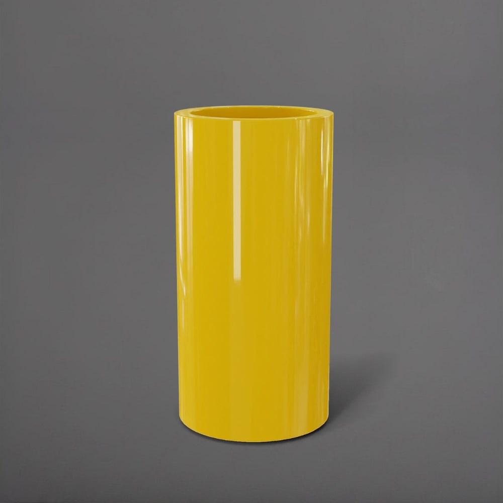 Corry Tall Cylinder Fiberglass Planter in gloss saffron against gray background. 