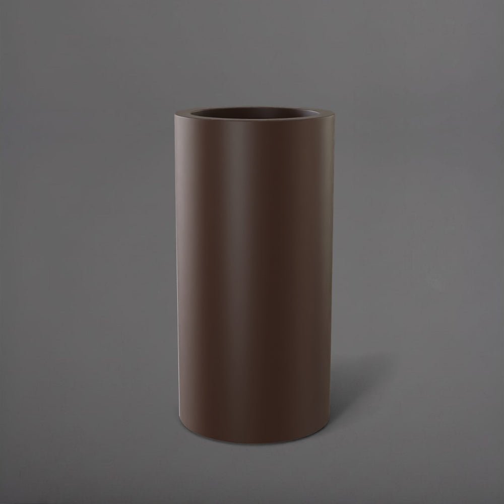 Corry Tall Cylinder Fiberglass Planter in matte dark brown against gray background. 