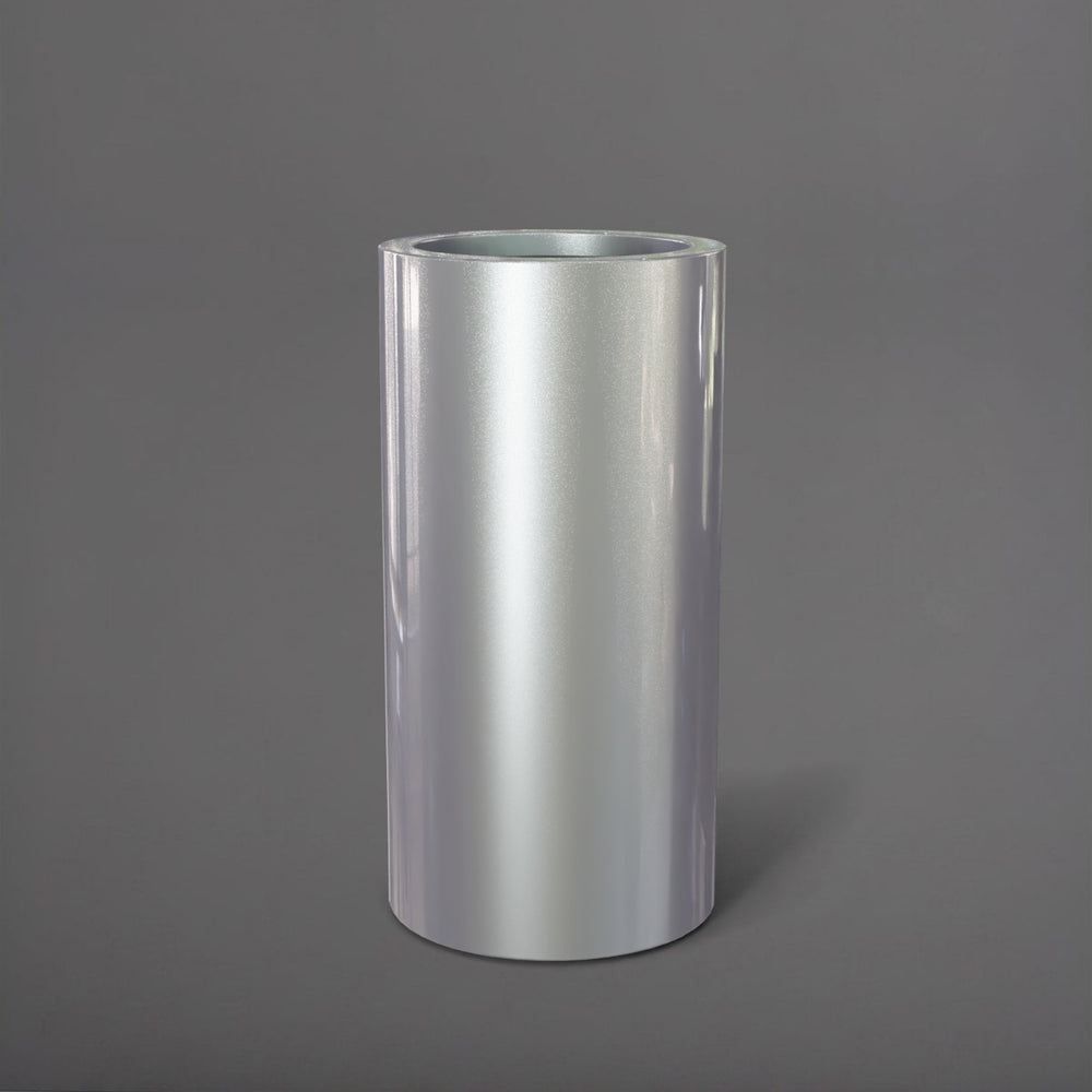 Corry Tall Cylinder Fiberglass Planter in metallic silver against gray background. 
