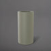 Corry Tall Cylinder Fiberglass Planter in satin beige against gray background. 