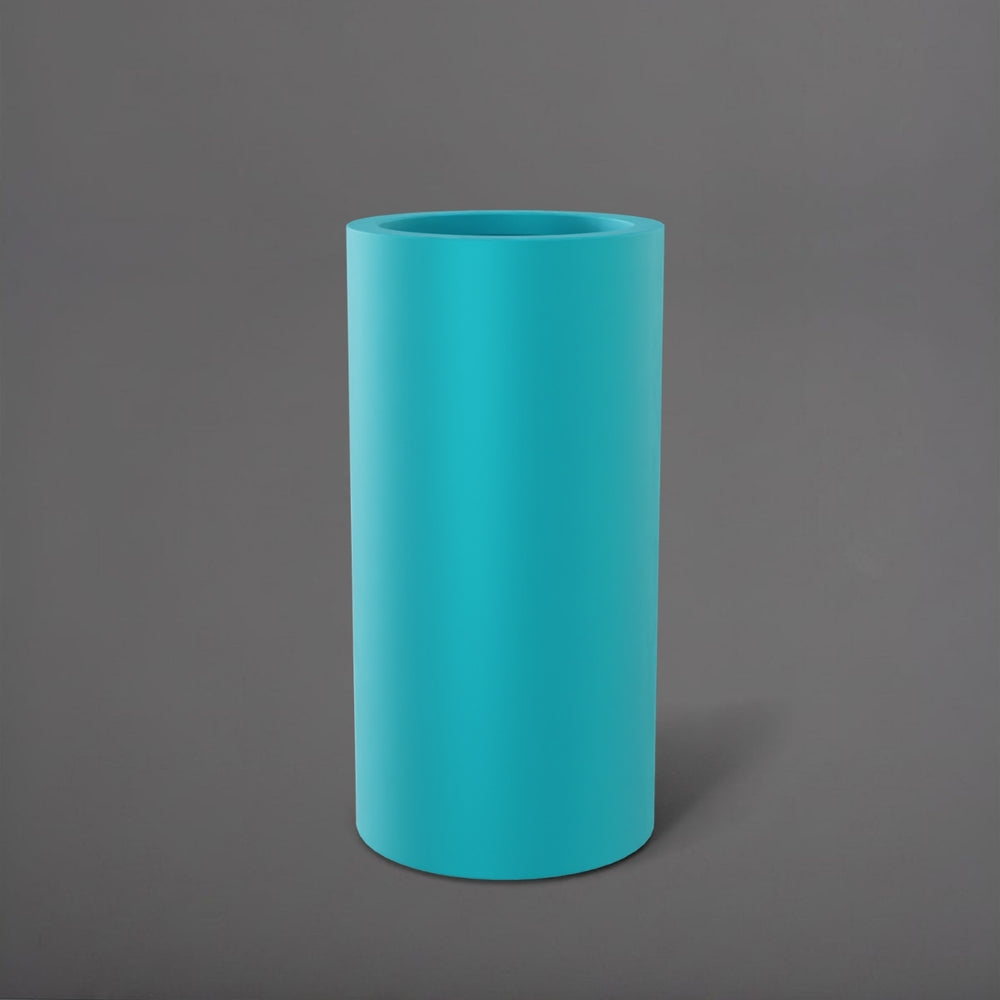 Corry Tall Cylinder Fiberglass Planter in satin seafoam green against gray background. 