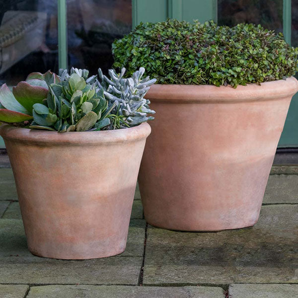 Cortona Planter, Large - Terra Cotta - S/2 on concrete filled with plants